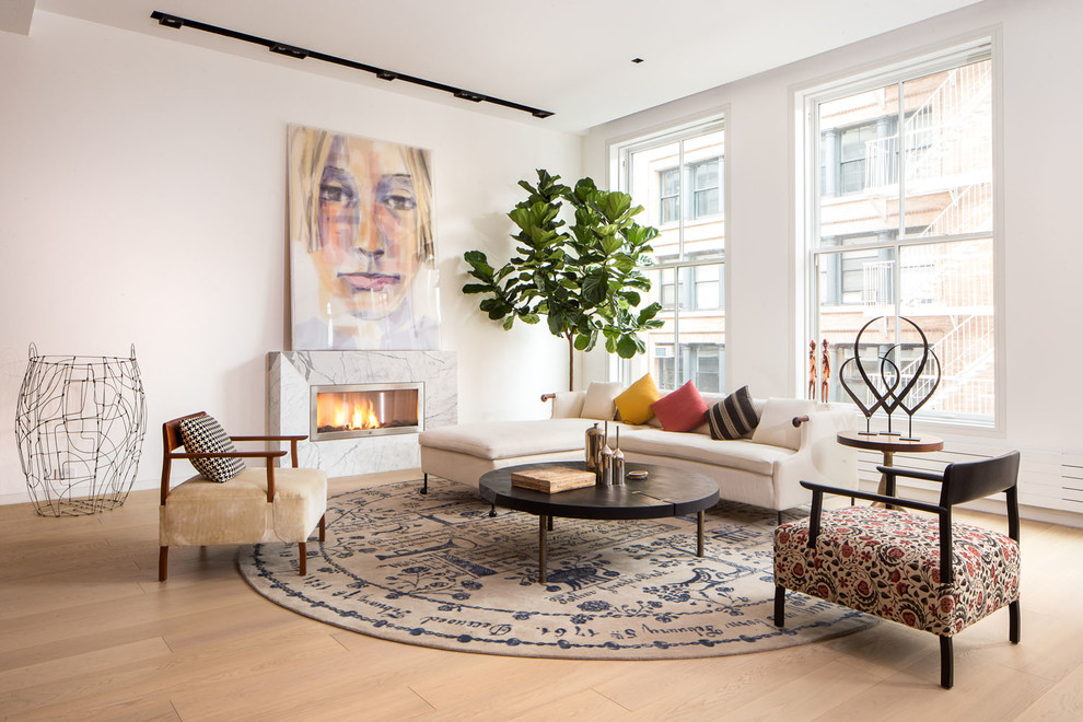 Inspiration for a contemporary open concept light wood floor living room remodel in New York with white walls, a ribbon fireplace and a metal fireplace