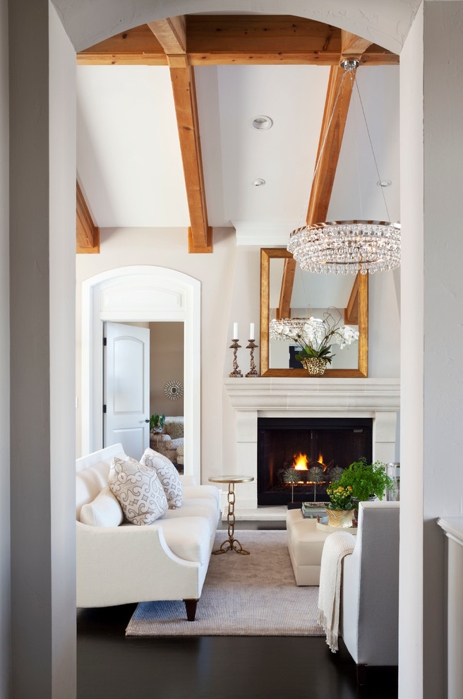 Transitional enclosed dark wood floor living room photo in Denver with beige walls and a standard fireplace
