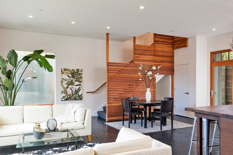 Example of a trendy open concept concrete floor living room design in San Francisco