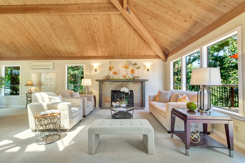 Example of a large transitional formal and open concept carpeted living room design in San Francisco with white walls, a standard fireplace, a tile fireplace and no tv