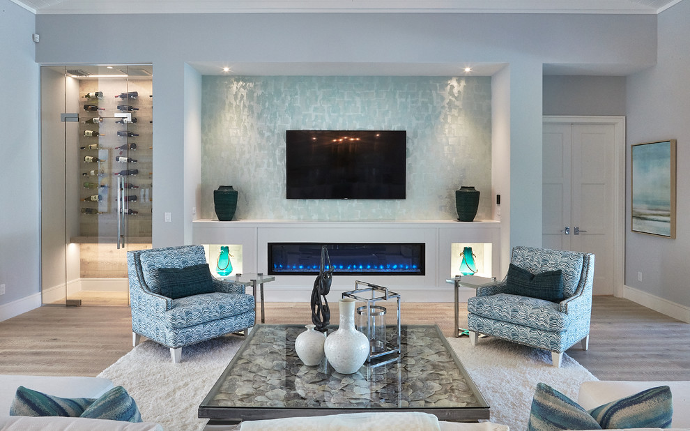 Living room - coastal open concept living room idea in Miami