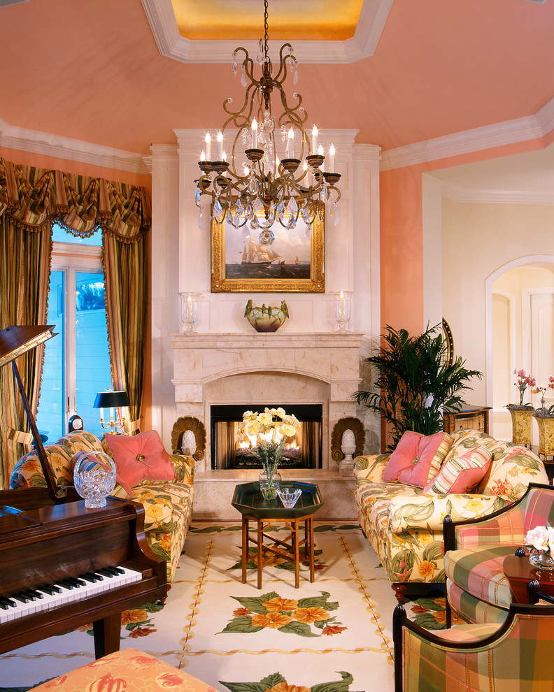 Свежая идея для дизайна: открытая гостиная комната среднего размера в морском стиле с музыкальной комнатой, розовыми стенами, паркетным полом среднего тона, стандартным камином и фасадом камина из камня без телевизора - отличное фото интерьера
