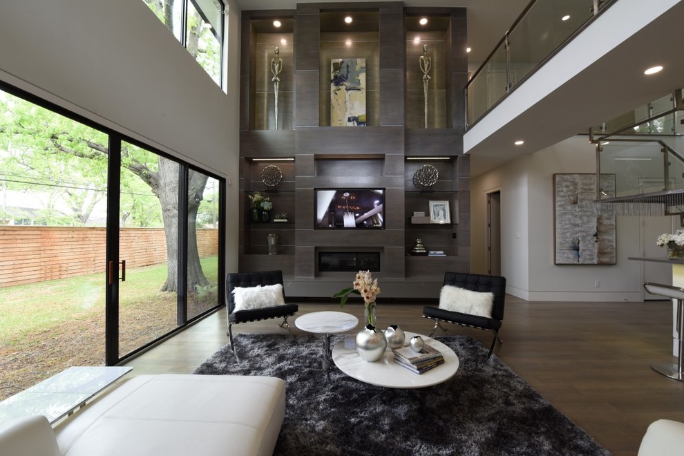 This is an example of a contemporary living room in Dallas.