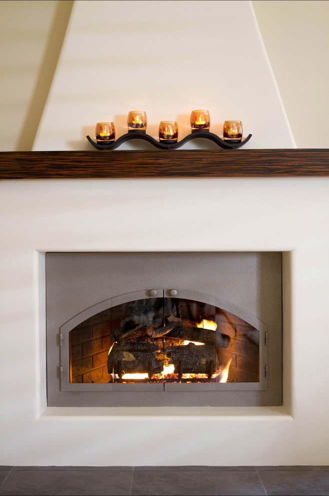 A fresh take on an adobe fireplace Living Room Los Angeles by Talianko Design Group, LLC