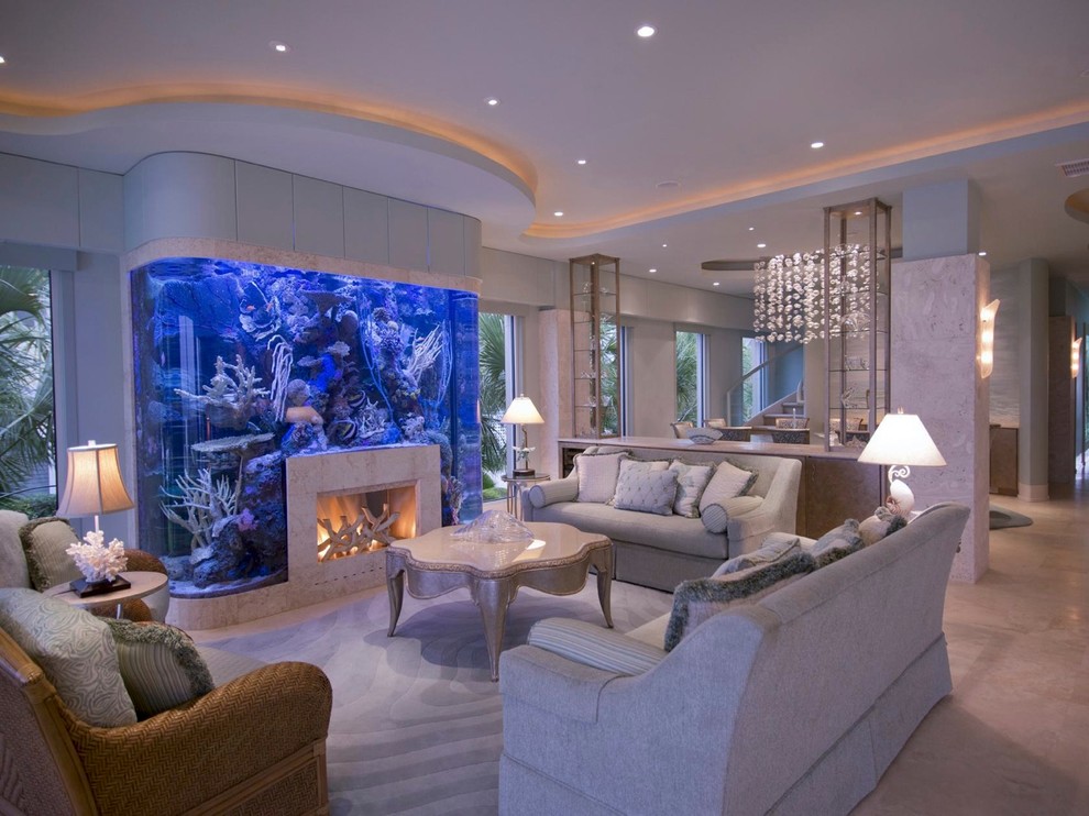 Inspiration for a world-inspired formal open plan living room in Other with limestone flooring, a stone fireplace surround, a standard fireplace and feature lighting.