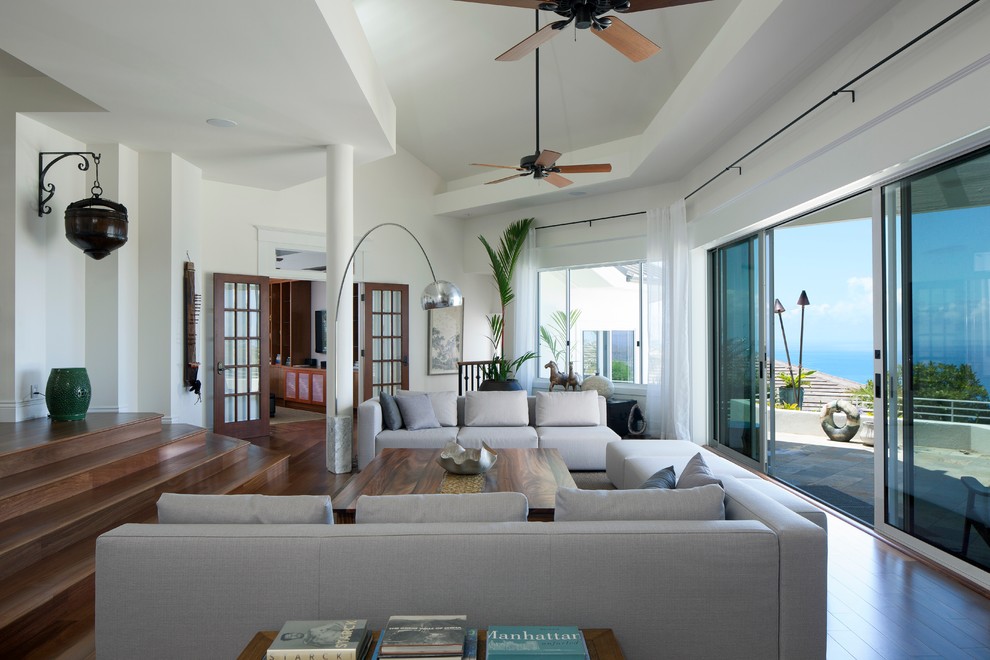 Design ideas for a world-inspired open plan living room in Hawaii.