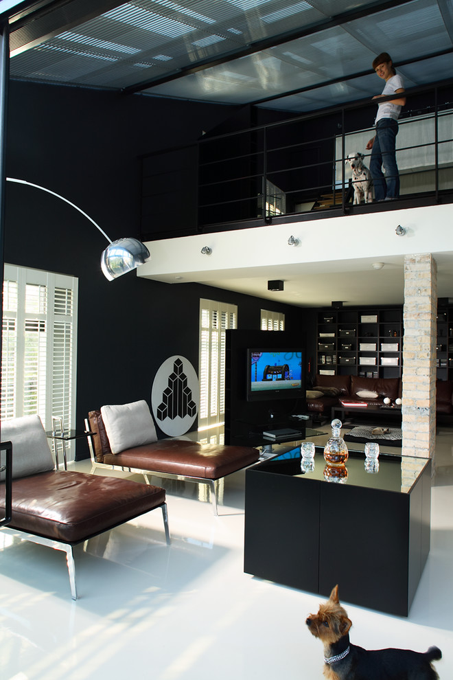 Idee per un soggiorno minimalista con pareti nere