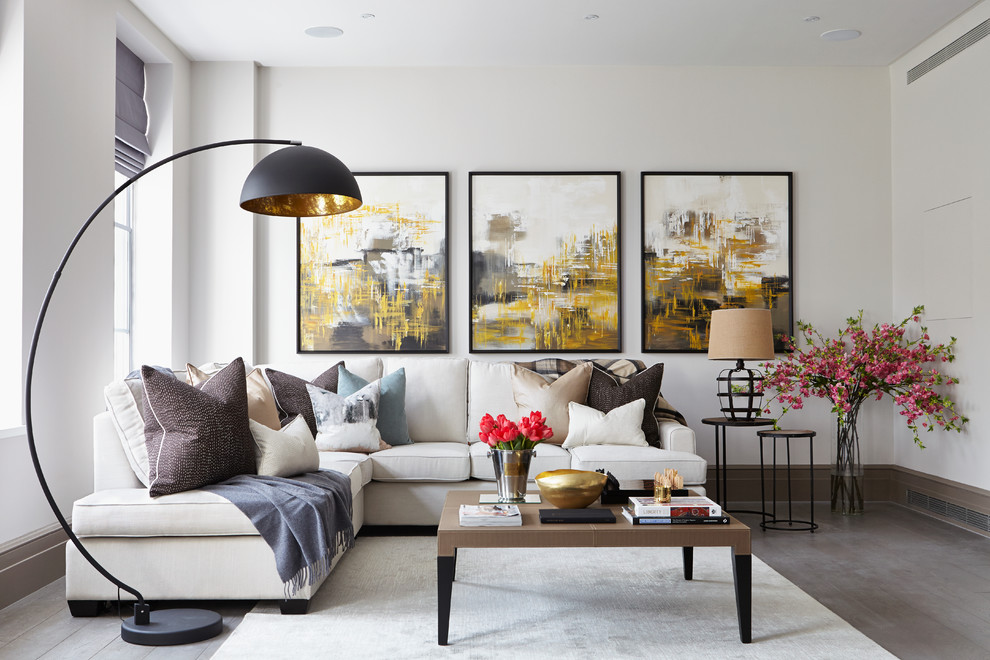 Design ideas for a contemporary living room in London with white walls and feature lighting.