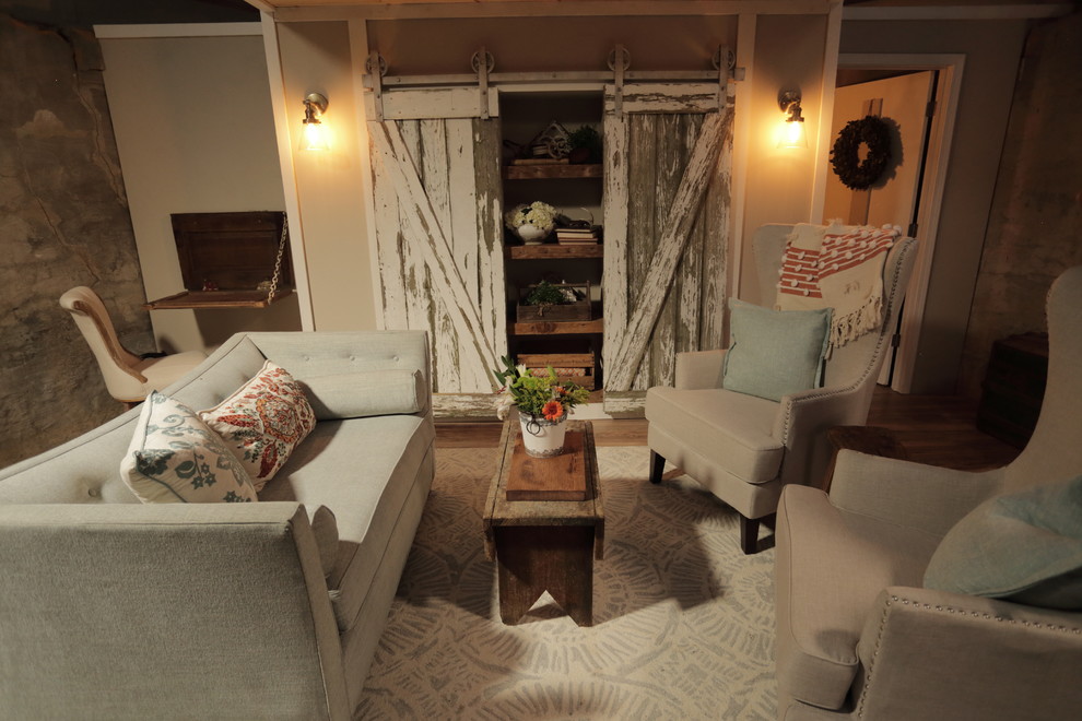 This is an example of a small farmhouse open plan living room in Other with light hardwood flooring.