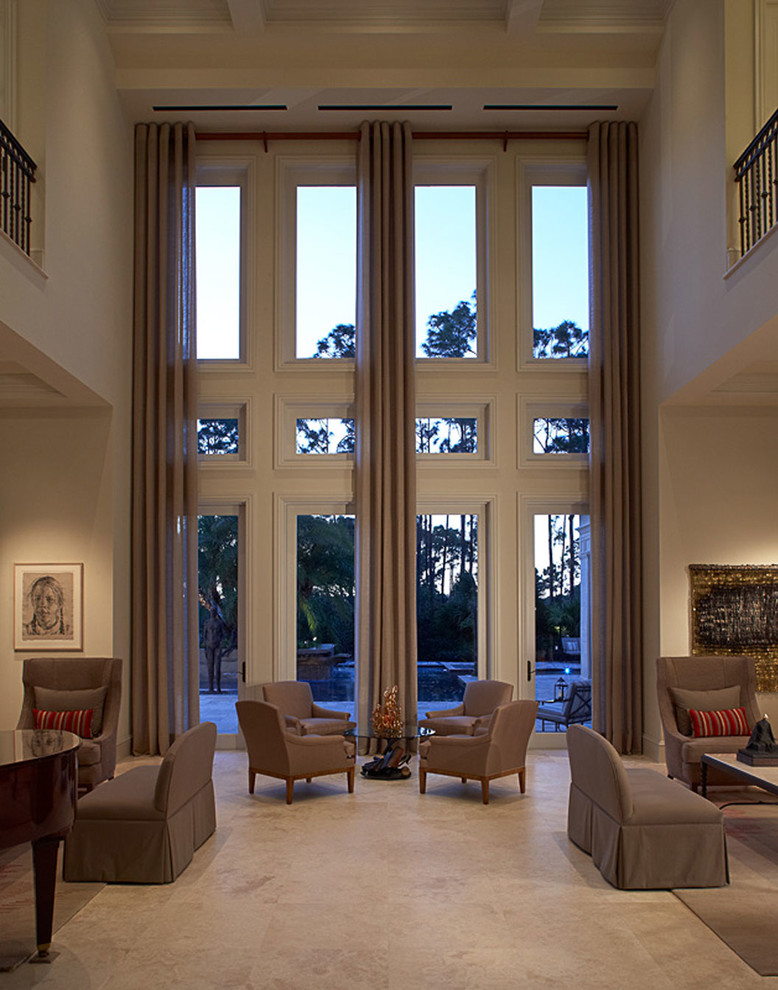 Immagine di un ampio soggiorno design aperto con sala formale, pareti beige, nessun camino, nessuna TV e pavimento in marmo