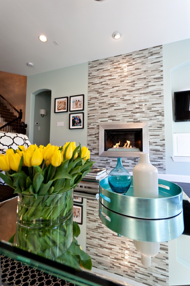 Inspiration for a contemporary living room remodel in Dallas with a metal fireplace