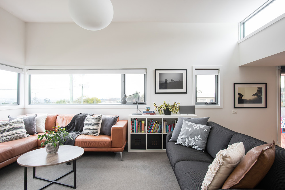 Living room - small contemporary open concept carpeted and gray floor living room idea in Other with white walls
