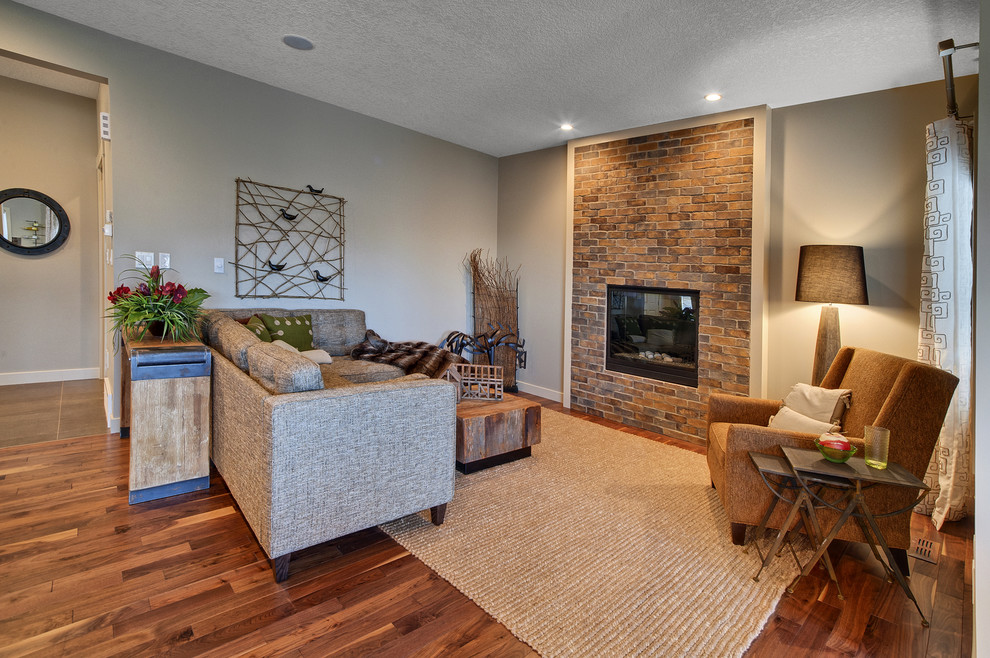 Foto di un soggiorno minimal di medie dimensioni con pareti grigie