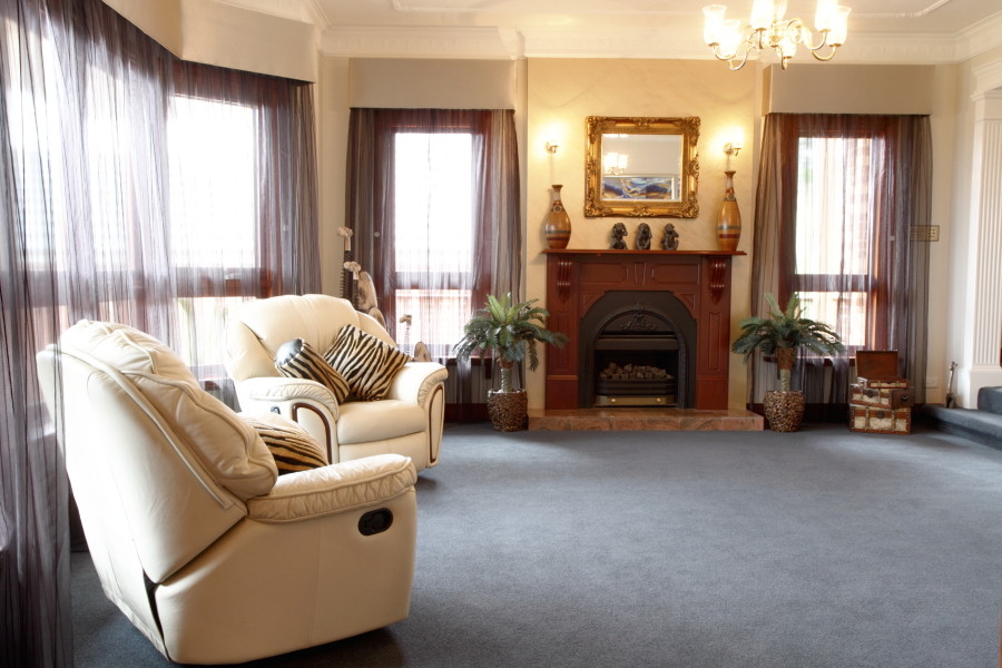 Example of a mid-sized classic open concept carpeted living room design in Sydney with beige walls