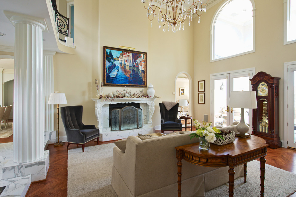 Inspiration for a large traditional formal open plan living room in Raleigh with yellow walls, dark hardwood flooring, a standard fireplace, a stone fireplace surround and no tv.