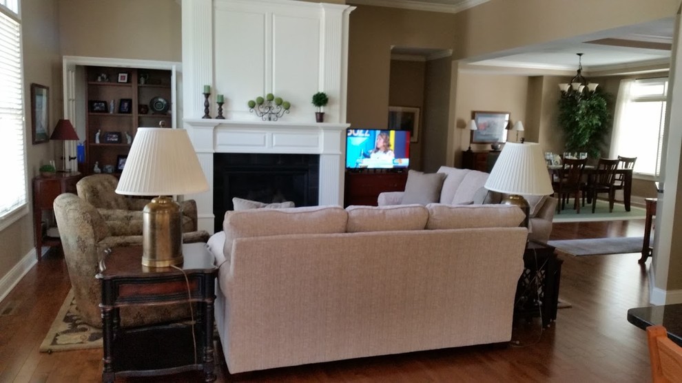 Design ideas for a classic open plan living room in Cedar Rapids with medium hardwood flooring.