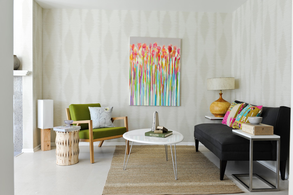 Immagine di un piccolo soggiorno minimalista con pareti beige