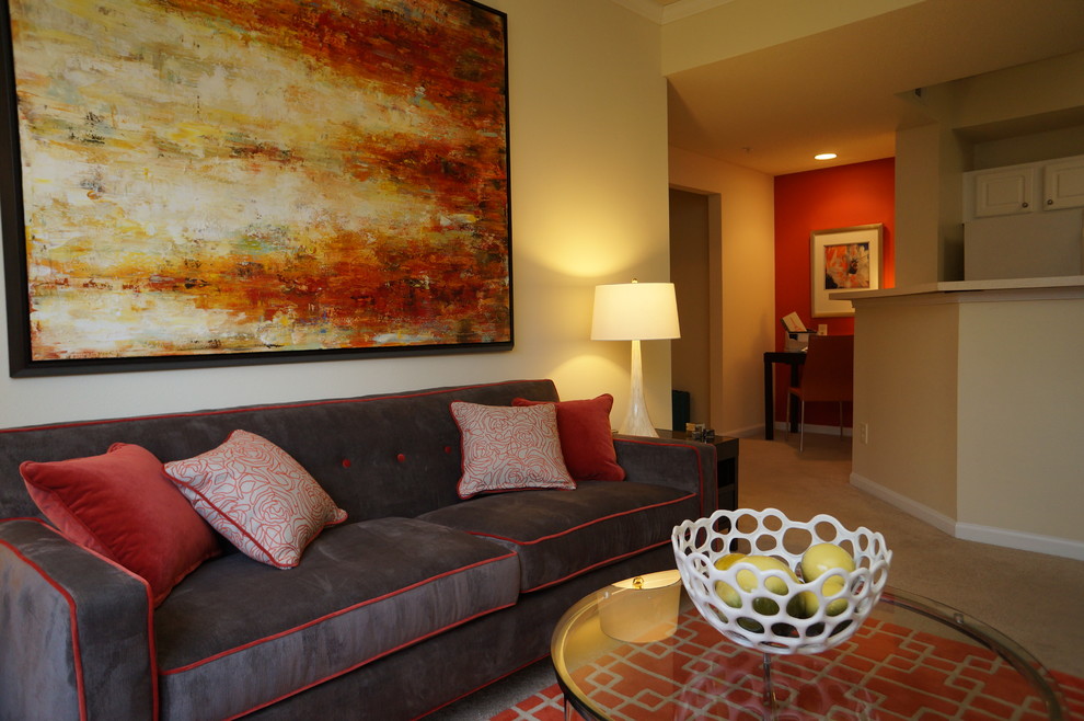 Esempio di un soggiorno design di medie dimensioni con pareti beige