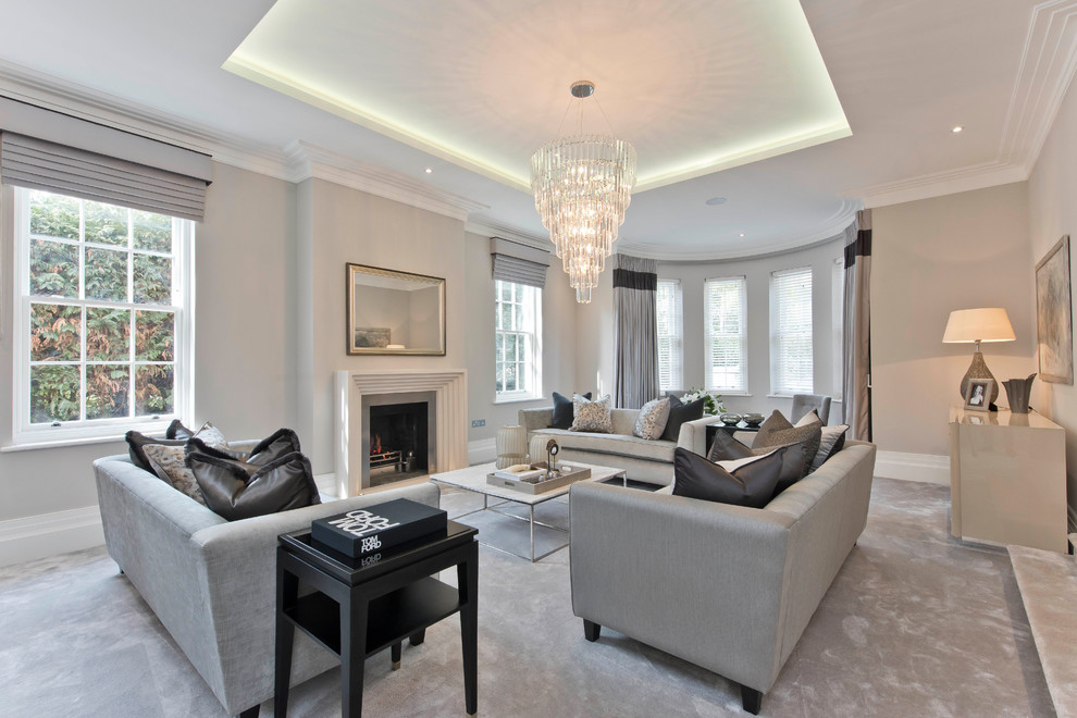 Example of a transitional living room design in Surrey