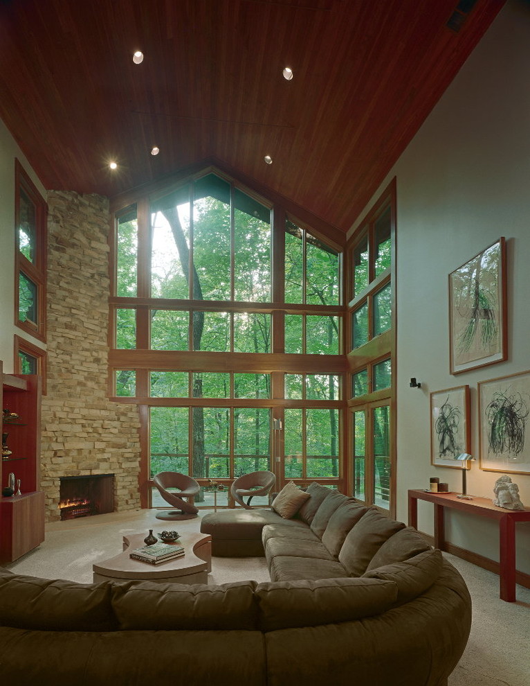 Photo of a large contemporary open plan living room in Chicago with white walls, carpet, a corner fireplace and a stone fireplace surround.