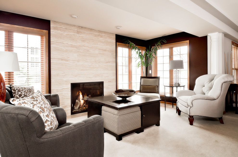 Photo of a medium sized classic formal open plan living room in Chicago with brown walls, a standard fireplace, carpet, a tiled fireplace surround and no tv.