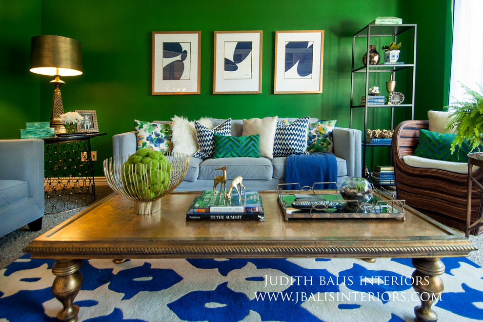 Inspiration for a small eclectic enclosed living room in Boise with green walls, carpet and a built-in media unit.