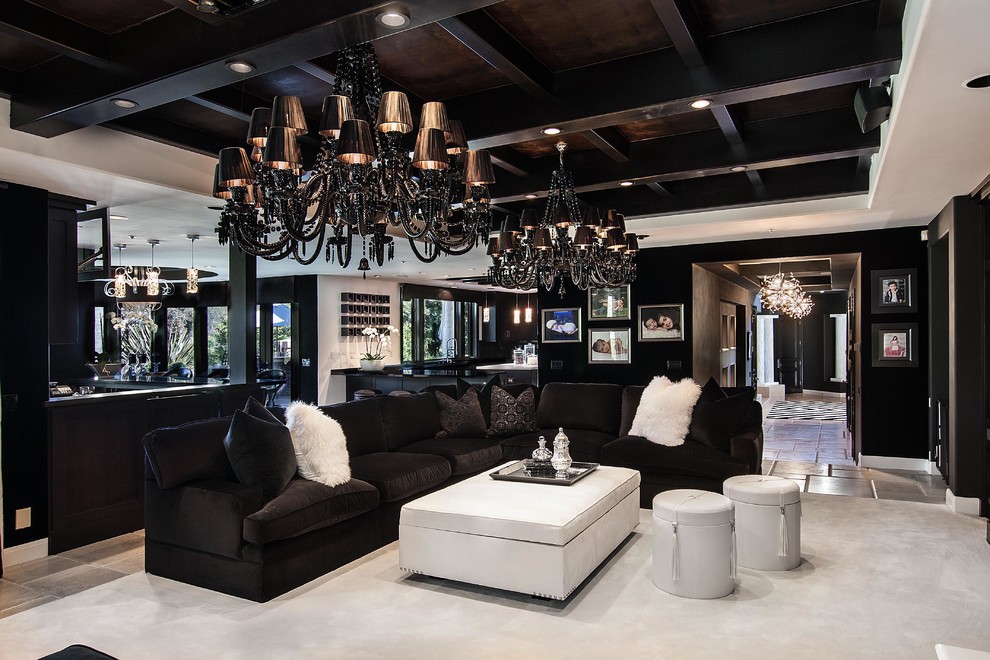 Inspiration for a contemporary living room in Orange County with black walls.