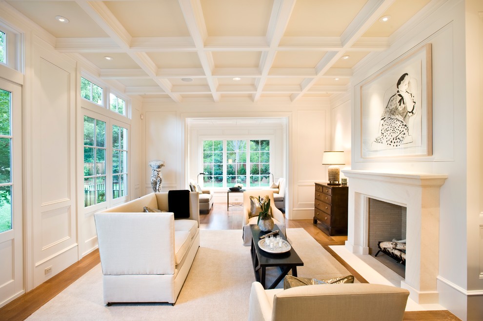 Inspiration for a large contemporary living room remodel in San Francisco with white walls and a standard fireplace