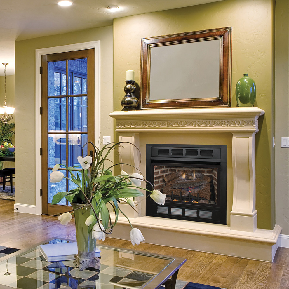 Inspiration for a timeless living room remodel in Orange County with a standard fireplace