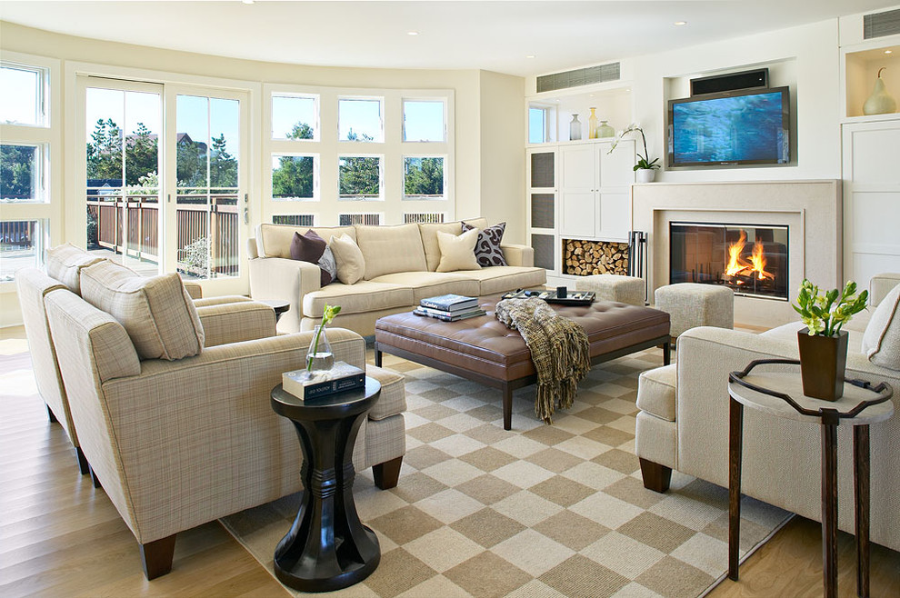 Inspiration for a large coastal living room remodel in New York with a standard fireplace and a media wall