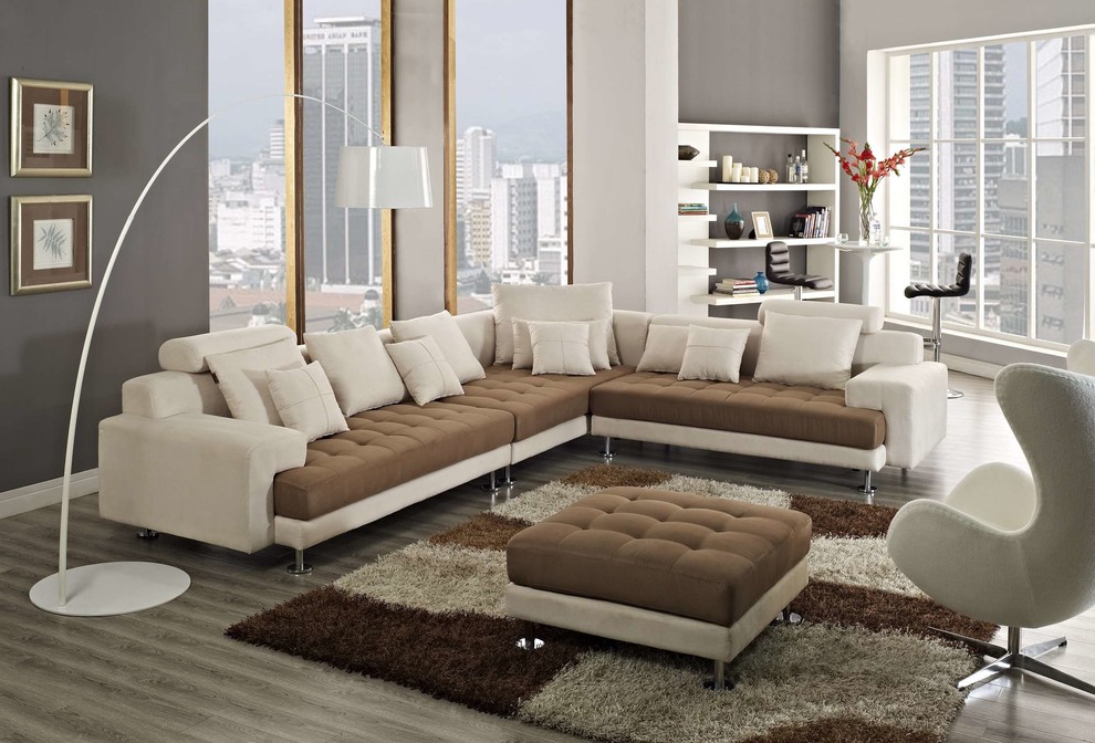 Esempio di un grande soggiorno minimalista stile loft con sala formale, pareti grigie, nessuna TV, parquet chiaro, nessun camino e pavimento beige