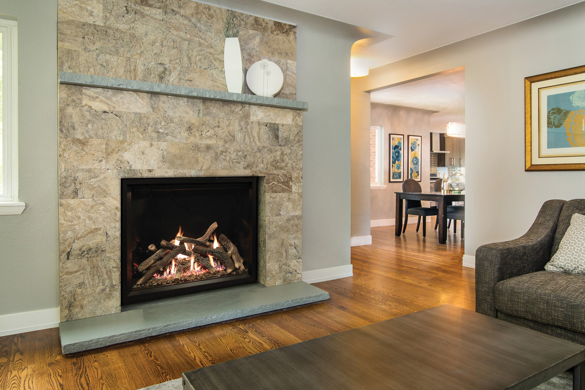 Inspiration for a mid-sized timeless formal and enclosed medium tone wood floor and brown floor living room remodel in Other with beige walls, a standard fireplace and a tile fireplace