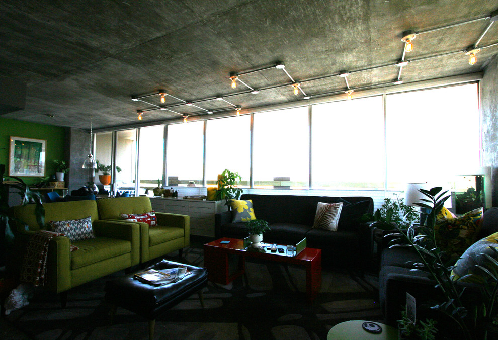 Exempel på ett mellanstort modernt allrum med öppen planlösning, med grå väggar och betonggolv