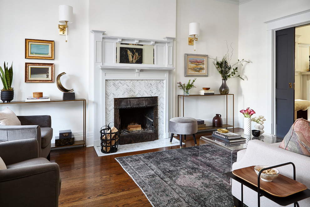 Mid-sized elegant enclosed dark wood floor and brown floor living room photo in Toronto with white walls, a standard fireplace and a tile fireplace