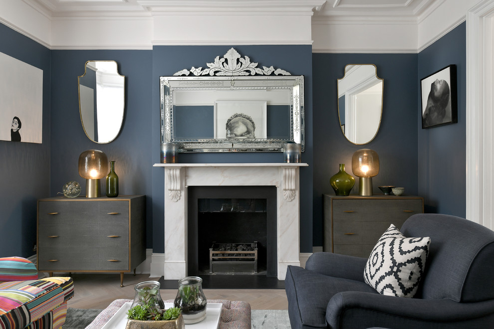 Inspiration for a victorian living room remodel in London with blue walls