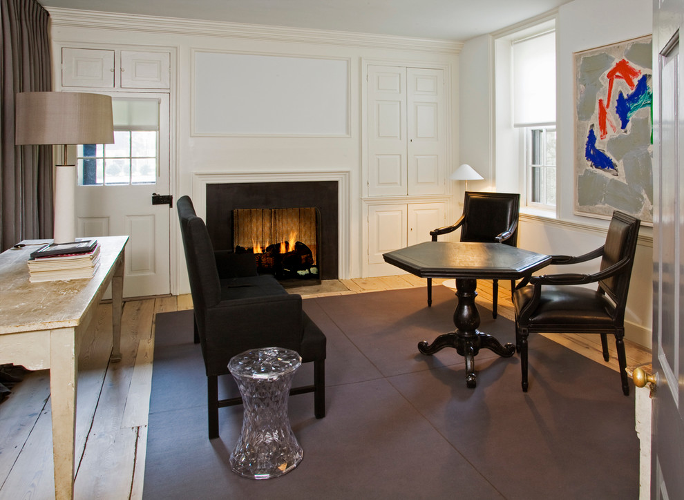 Example of a huge country formal and enclosed light wood floor living room design in Philadelphia with white walls, a standard fireplace and a metal fireplace