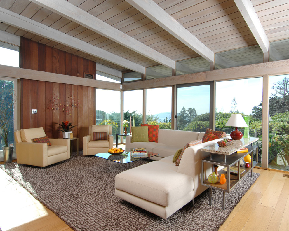 Design ideas for a medium sized retro open plan living room in San Francisco with light hardwood flooring.