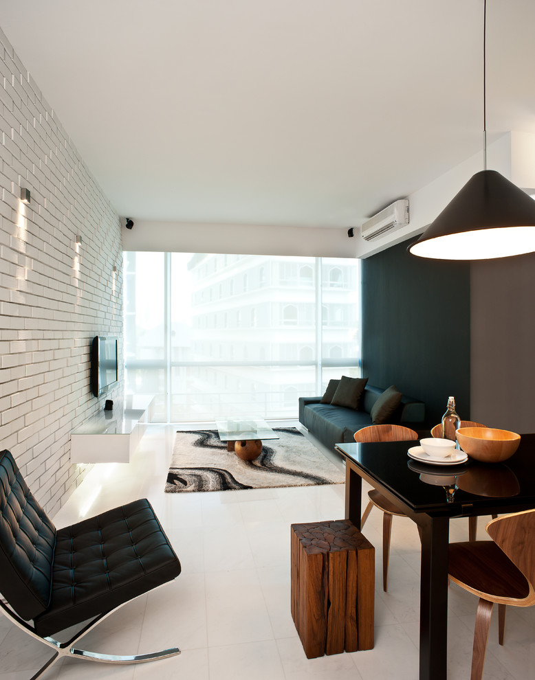 Inspiration for a modern white floor living room remodel in Singapore with no fireplace, a wall-mounted tv and multicolored walls