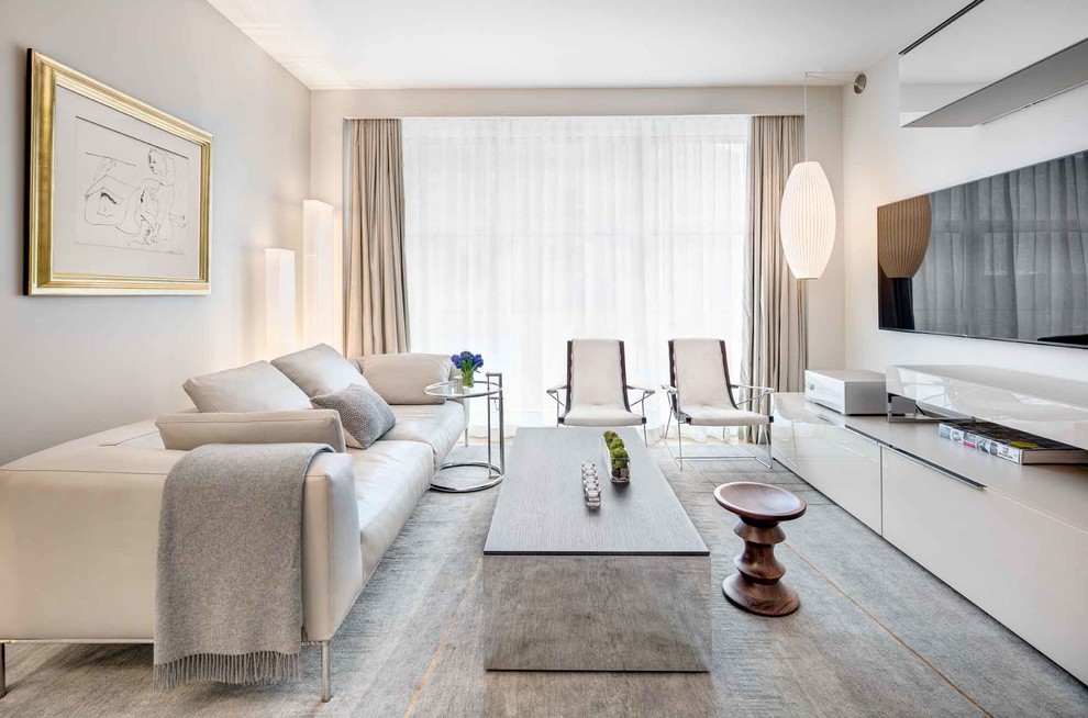 Идея дизайна: парадная, изолированная гостиная комната среднего размера в современном стиле с телевизором на стене, белыми стенами, ковровым покрытием и серым полом без камина