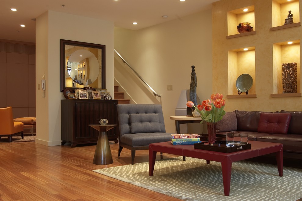 Example of a trendy living room design in San Francisco with beige walls