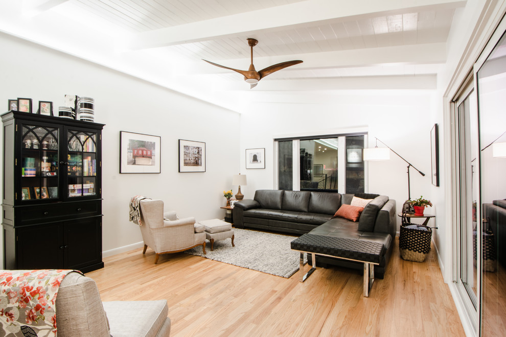 Mid-sized 1950s formal and open concept light wood floor living room photo in Denver with white walls, a two-sided fireplace and a tile fireplace