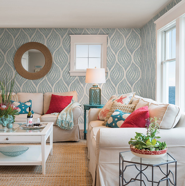 Inspiration for a tropical living room remodel in Boston with blue walls