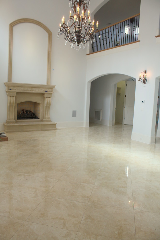 Example of a tuscan living room design in Charlotte