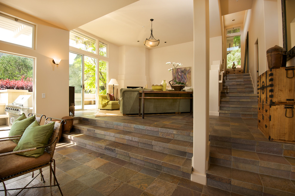 Example of a trendy open concept slate floor living room design in San Francisco
