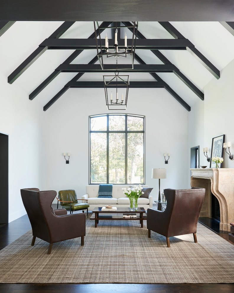 Inspiration for a transitional formal dark wood floor living room remodel in Los Angeles with white walls and a standard fireplace