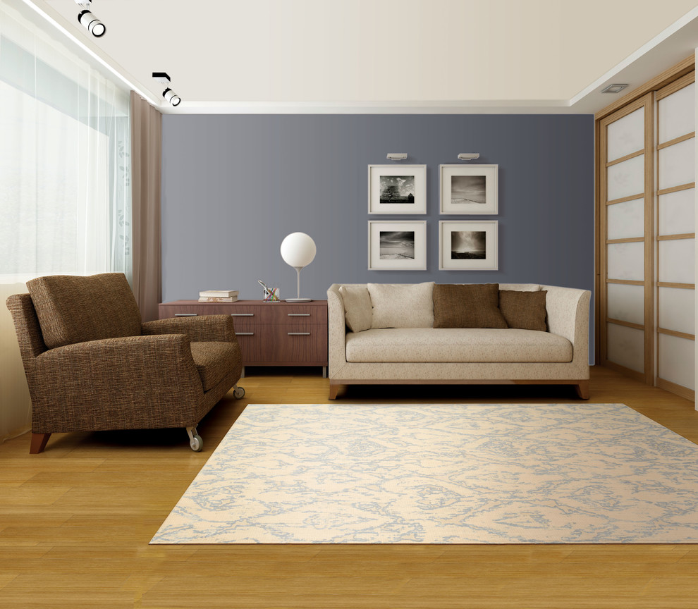 Idee per un soggiorno design di medie dimensioni e chiuso con sala formale, pareti blu, parquet chiaro, nessun camino, nessuna TV e pavimento beige