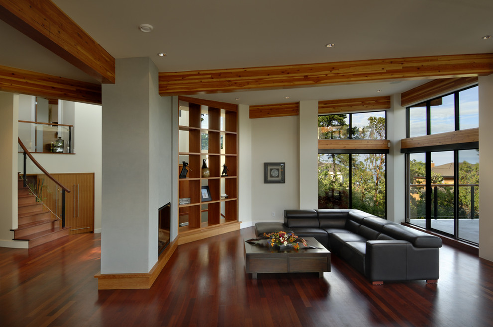 Contemporary living room in Vancouver with white walls.