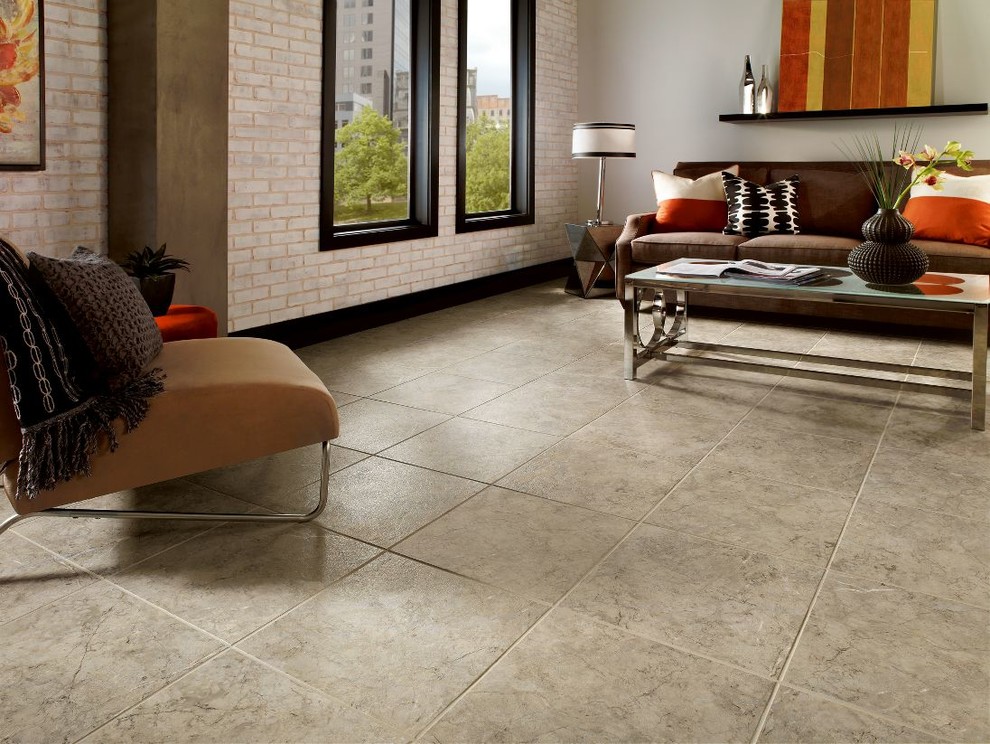 Esempio di un soggiorno industriale con pavimento con piastrelle in ceramica e pavimento beige
