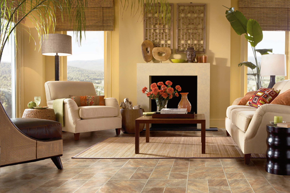 Example of a mid-sized island style formal and open concept linoleum floor living room design in Orlando with yellow walls, a standard fireplace, a concrete fireplace and no tv