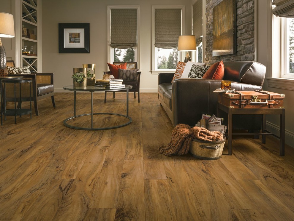 Inspiration for a medium sized rustic formal enclosed living room in Chicago with grey walls, light hardwood flooring and no tv.